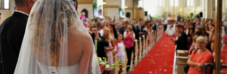 A couple walking down the isle 