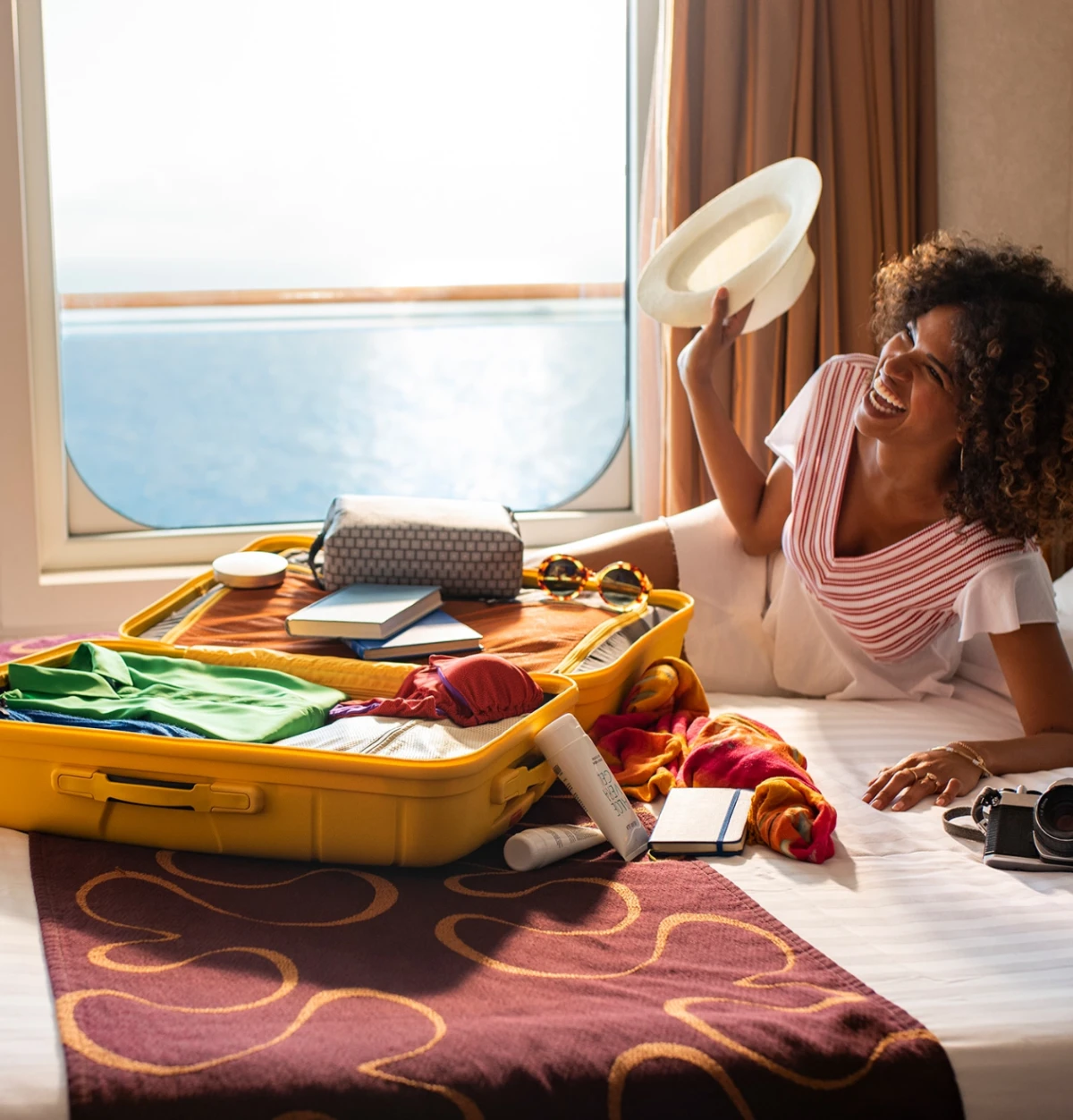 woman on cruise with suitcase