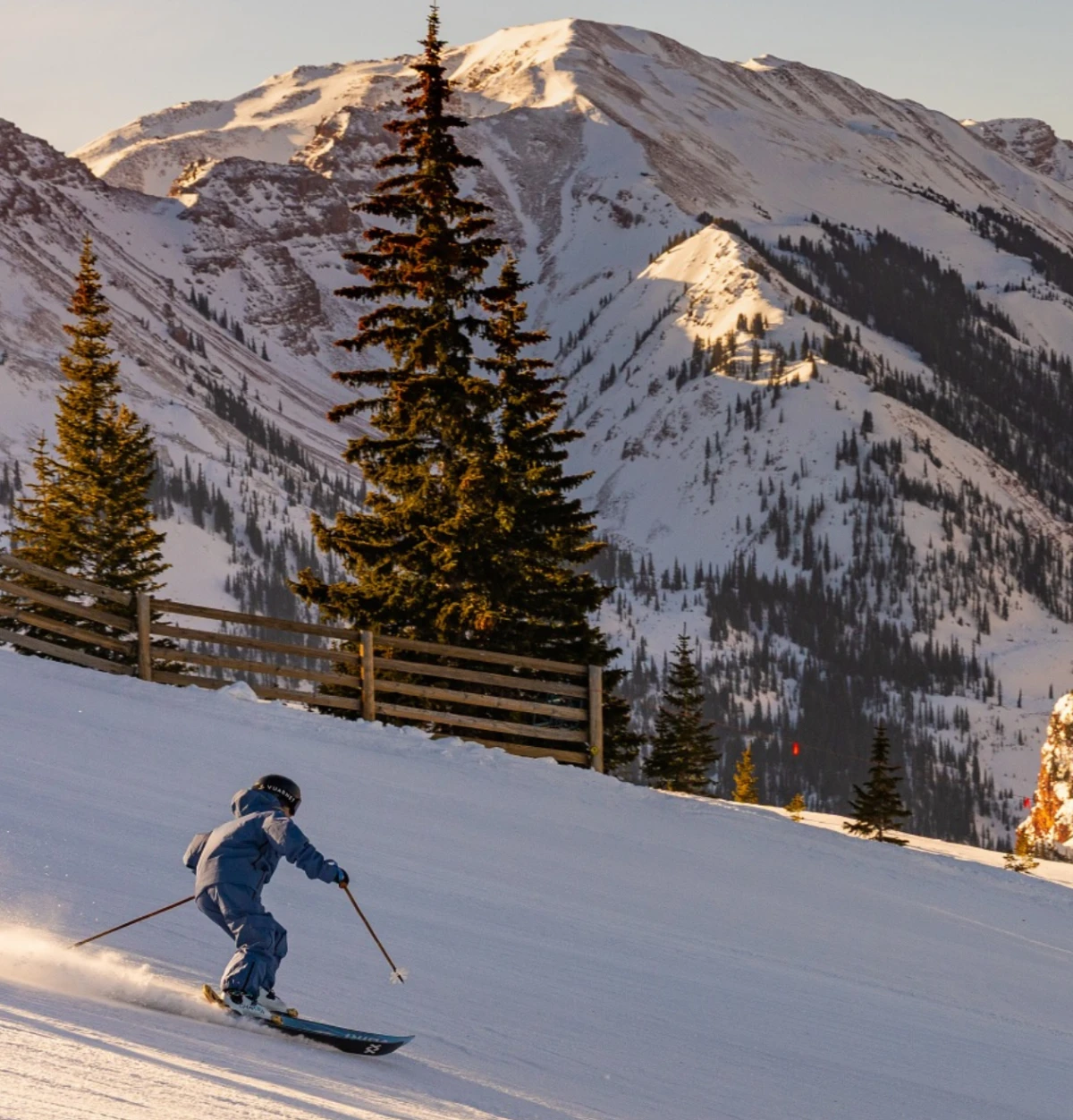 person skiing in aspen