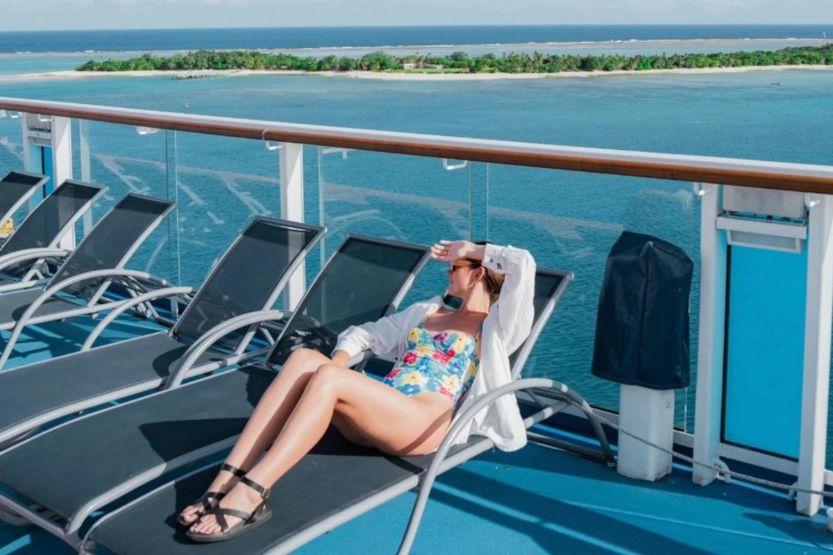 woman on deck chair on cruise