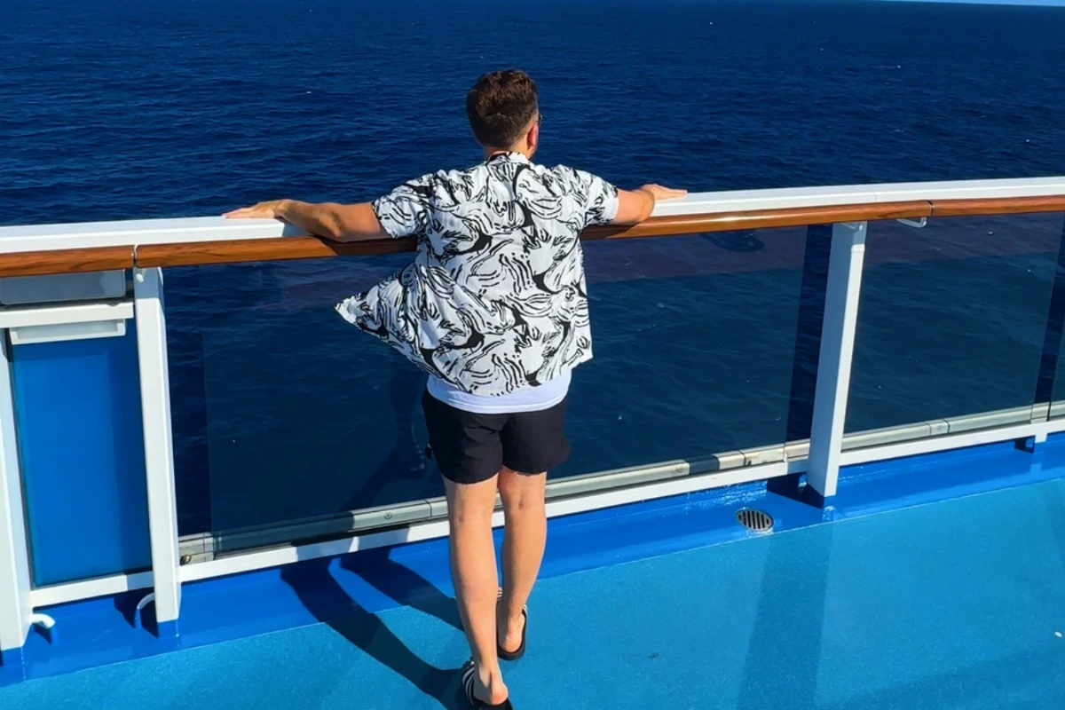 person on deck of a cruise ship